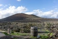 Wooden wine barrel at the entrance to the vineyard. Lanzarote. Canary Islands