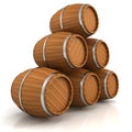 Wooden wine barrels pyramid on white