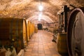 Wooden wine barrels in an underground cellar, Melnik