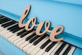 Wooden word love on piano wedding concept Royalty Free Stock Photo