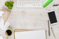 Wooden work desk top view with copyspace in the middle