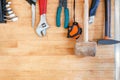 Wooden workbench at workshop. Lot of different tools for diy and repair works. Wood desk for product display. Copyspace. Labour da