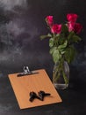 Wooden writing board with pink roses