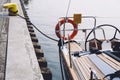 Wooden yacht docked at pier Royalty Free Stock Photo