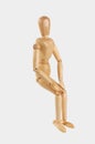 Woodes marionette seating Royalty Free Stock Photo