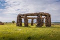 Woodhenge, the wooden replica Stonehenge at Matravers Worth, Dorset, UK in a meadow of grass and wild flowers