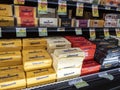 Woodinville, WA USA - circa April 2022: Angled view of Tillamook cheese bricks for sale in the refrigerated section of a Haggen