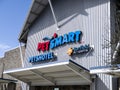 Woodinville, WA USA - circa April 2021: Close up view of a PetsMart retail store entrance on a sunny day