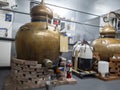 Woodinville, WA USA - circa August 2021: View of the interior of Pacific Distillery, where the gin is distilled in large copper