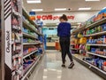 Woman browsing medicine and supplements in the CVS pharmacy inside a Target store