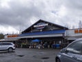 Woodinville, WA USA - circa March 2021: View of the store front of a McLendon Hardware store from the parking lot on a cloudy day