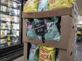 Woodinville, WA USA - circa May 2022: Angled close up of Angie`s Boom Chicka Pop popcorn snacks inside a Haggen Northwest Fresh