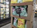 Woodinville, WA USA - circa May 2022: Angled close up of Angie`s Boom Chicka Pop popcorn snacks inside a Haggen Northwest Fresh