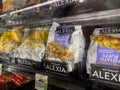 Woodinville, WA USA - circa May 2022: Angled view of Alexia brand potatoes for sale inside the freezer section of a Haggen grocery