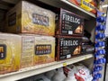 Woodinville, WA USA - circa May 2022: Angled view of indoor fire logs for sale inside a Haggen grocery store