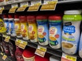 Woodinville, WA USA - circa May 2022: Angled view of a variety of coffee creamers for sale inside a Haggen grocery store