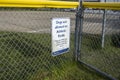 Woodinville, WA USA - circa May 2022: Close up view of a sign discouraging dogs on the athletic field at the Woodinville sports Royalty Free Stock Photo