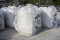 Woodinville, WA USA - circa May 2022: View of large bags of infill sand for a baseball field in a parking lot