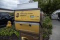 Woodinville, WA USA - circa September 2021: Angled view of a UPS package and letter deposit station in downtown Woodinville