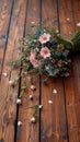 Woodland elegance close up of rustic bouquet on wooden floor