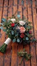 Woodland elegance close up of rustic bouquet on wooden floor