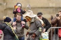 Woodland mask and bystanders at Carnival parade, Stuttgart