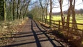 Woodland Ride alongside a golf course