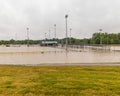 Flooded baseball fields and concession stand.