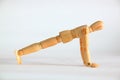 Woodmodel is exercises, Set still life. Royalty Free Stock Photo