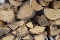 Woodpile lies in a heap, chopped for burning in a furnace. Finely chopped and stacked firewood, background. Laid dry