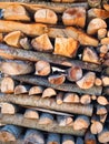 Woodpile lies in a heap, chopped for burning in a furnace. Finely chopped and stacked firewood, background. Laid dry Royalty Free Stock Photo