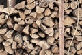 Woodpile of various shaped split logs to be burned in a home wood stove Royalty Free Stock Photo