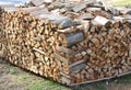 Woodshed with many pieces of wood ready to be burned to keep war