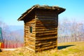 Woodshed in the mountains or storage room built in logs to store things