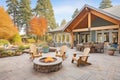 woodshingle retreat with outdoor fire pit in forest Royalty Free Stock Photo