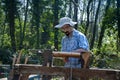 Woodturner working in the forest Royalty Free Stock Photo