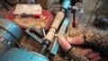 Woodturning and lathe in action. Craftmanship and skill.
