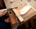 Woodwork: Boy making a model boat