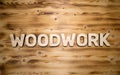 WOODWORK word made with building blocks on wooden board Royalty Free Stock Photo