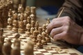 woodworker handcrafting intricate chess set with unique pieces