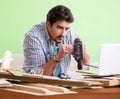 Woodworker working in his workshop Royalty Free Stock Photo