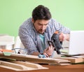 Woodworker working in his workshop Royalty Free Stock Photo