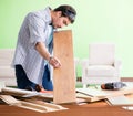 Woodworker working in his workshop Royalty Free Stock Photo