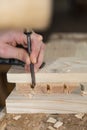 Woodworking with chisel - close-up Royalty Free Stock Photo