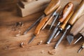 Woodworking tools on wooden workbench in carpentry workshop. Joinery and craft carving tools for wood processing Royalty Free Stock Photo