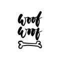 Woof-woof - Symbol of the year 2018 Dog hand drawn lettering quote isolated on the white background. Fun brush ink inscription for