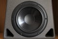 Woofer or bass cone of a high end hi-fi speaker cabinet Royalty Free Stock Photo