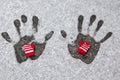 Wool gloves hand trace snow background