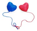 Two red and blue wool hearts