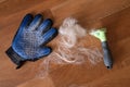 wool pet pile with grooming remove tool. grooming furminator and silicone glove comb. season molt concept